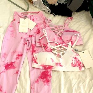 Leggings and two sports bras